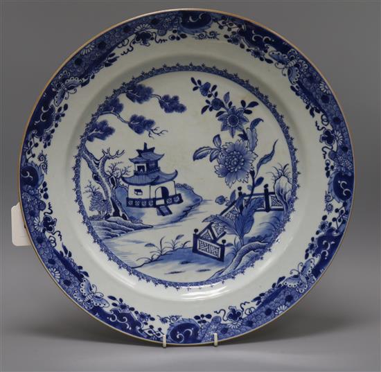 A Chinese 18th/19th century blue and white charger with lattice fence pattern